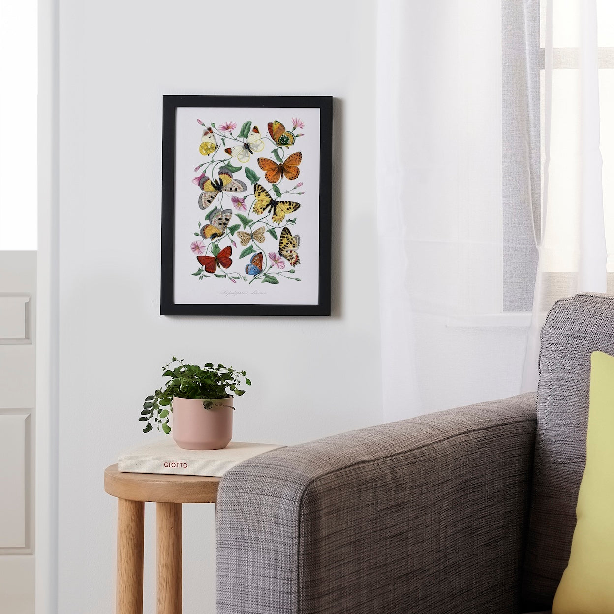Framed floral wall art with warm sunset tones