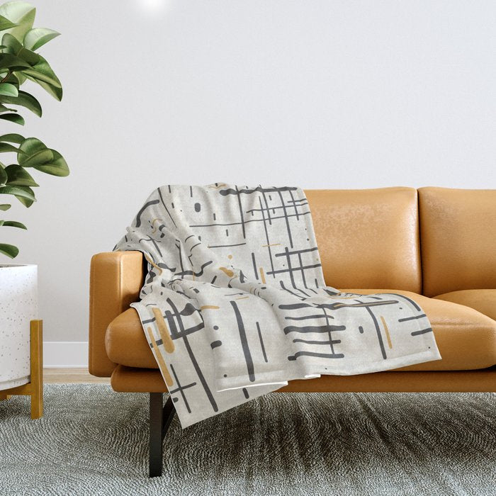 Mid-Century Modern Kinetikos Pattern In Charcoal Gray, Muted Mustard Gold, And Cream Throw Blanket