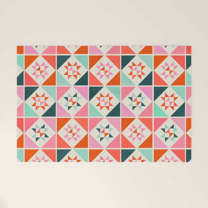 Festive Quilt Pattern In Pink, Red And Green Welcome Mat