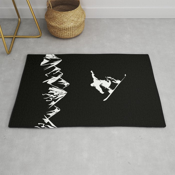 Rocky Mountain Snowboarder Catching Air Rug
