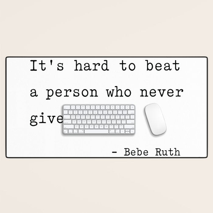 It Is Hard To Beat A Person Who Never Gives Up Desk Mat