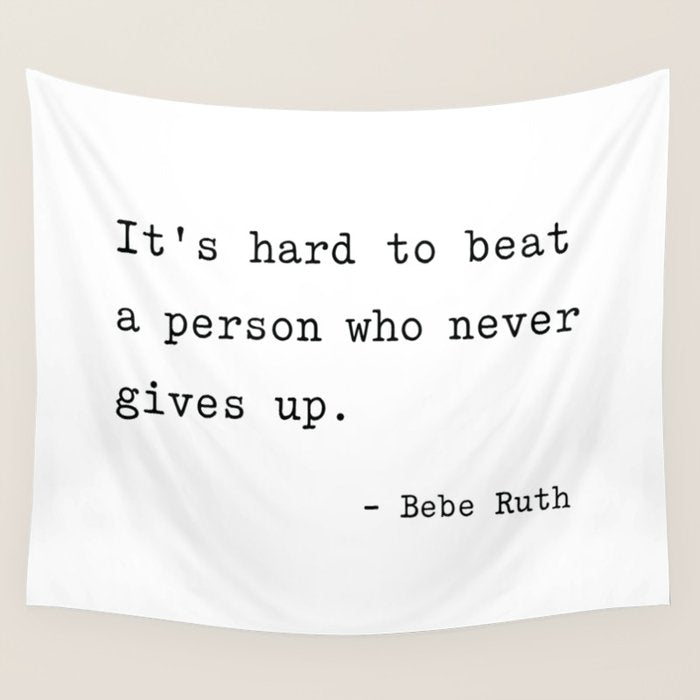It Is Hard To Beat A Person Who Never Gives Up Wall Tapestry